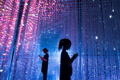 Spectators immerse in a brilliant illusion inside the Crystal Universe