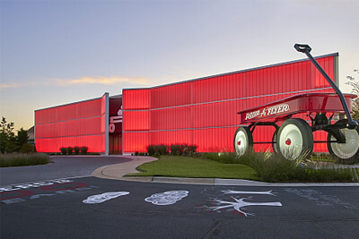 Iconic Radio Flyer Facility Shimmers with Colorful LED Beams